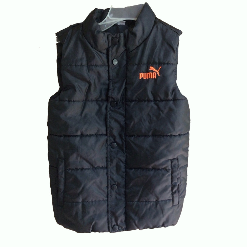 Puma Kids Black Vest with Orange Logo

Used in good condition